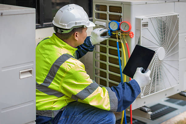 Professional Hvac Maintenance technician working in Dedham, MA